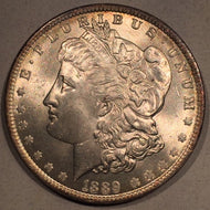 1889  Morgan Dollar, MS64, Superb overall appeal. interesting 4mm tone "spike" on rev. Exact coin imaged.