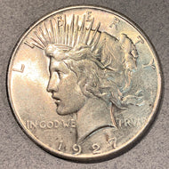 1927 Peace Dollar, AU58, light gold toning