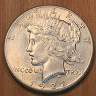 1928 Peace Dollar AU58. Exact coin imaged. This coin ships for free.