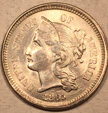 1865, MS63   Three Cent Nickel Piece, nice luster - neat coin with quadruple struck clashed dies and small peeled planchet on reverse.