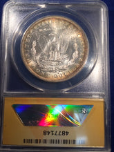 1883 O Morgan Dollar, ANACS slab MS64 gold toning around rim of both sides