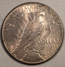 1928 Peace Dollar, Grade AU58, minor problems, representative picture- may not be the exact coin sent