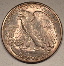 1944 Walking Half Dollar, Grade= MS63, nice peachy tone.