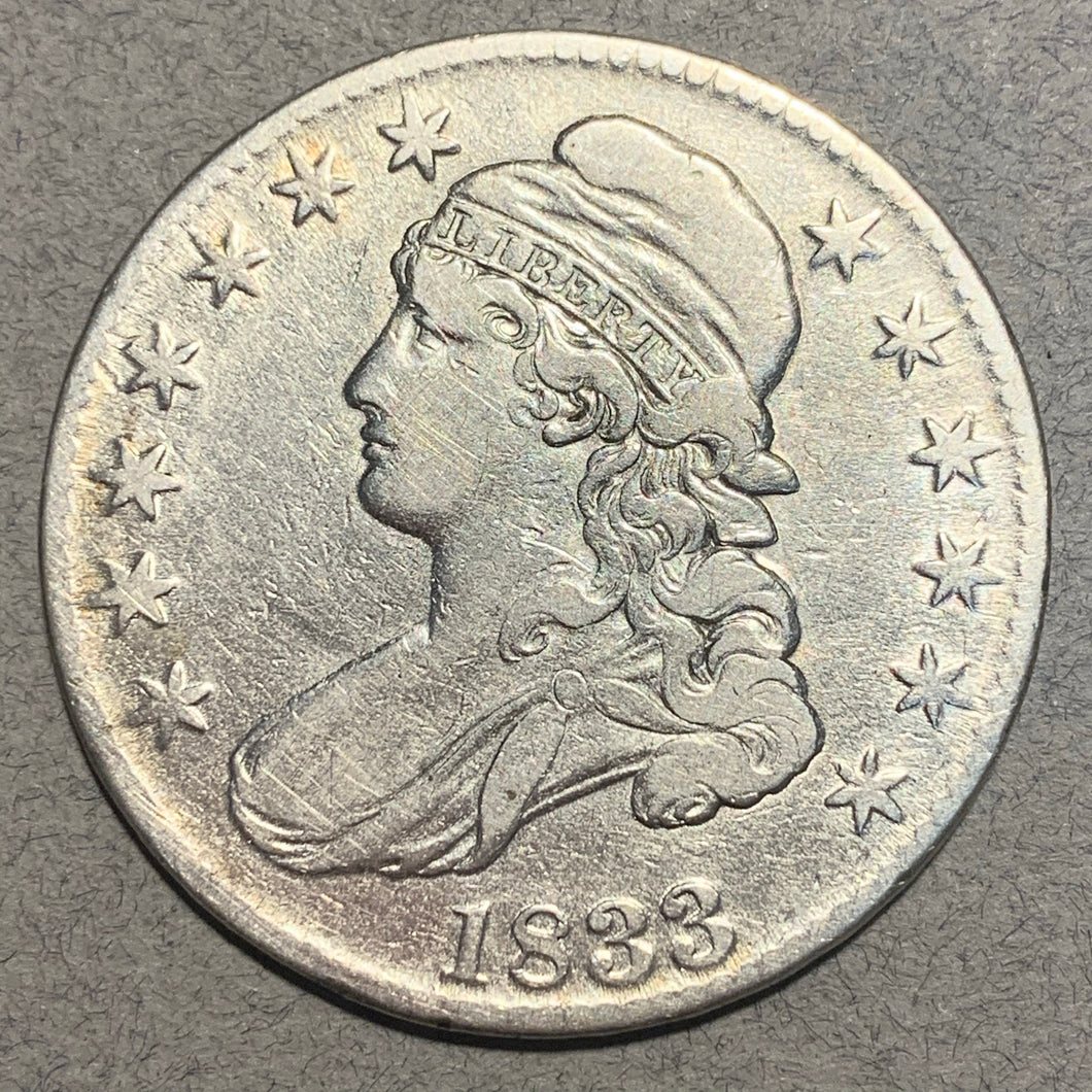 1833 Cap Bust Half Dollar, F18 heavily cleaned