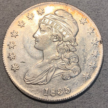 1835 Capped Bust Half Dollar  AU, cleaned. Exact coin imaged. This coin ships for free.