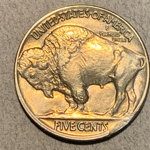 1914 Buffalo Nickel, Grade= MS63, cleaned at some point but now toned even gold. Also has a double profile