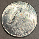 1928 Peace Dollar, MS63. Exact coin imaged. This coin ships for free.