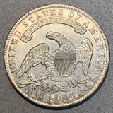 1835 Capped Bust Half Dollar  AU, cleaned. Exact coin imaged. This coin ships for free.