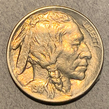 1914 Buffalo Nickel, Grade= MS63, cleaned at some point but now toned even gold. Also has a double profile